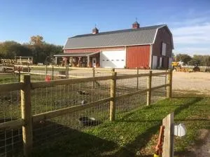 Barn with animal fencing.