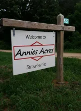 Sign welcoming you to Annie's Acres.