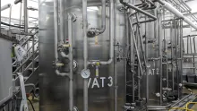 Stainless steel processing vats for dairy products.