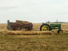 Tractor and wagon in field at Colony Pumpkin Patch in North Liberty, Iowa.